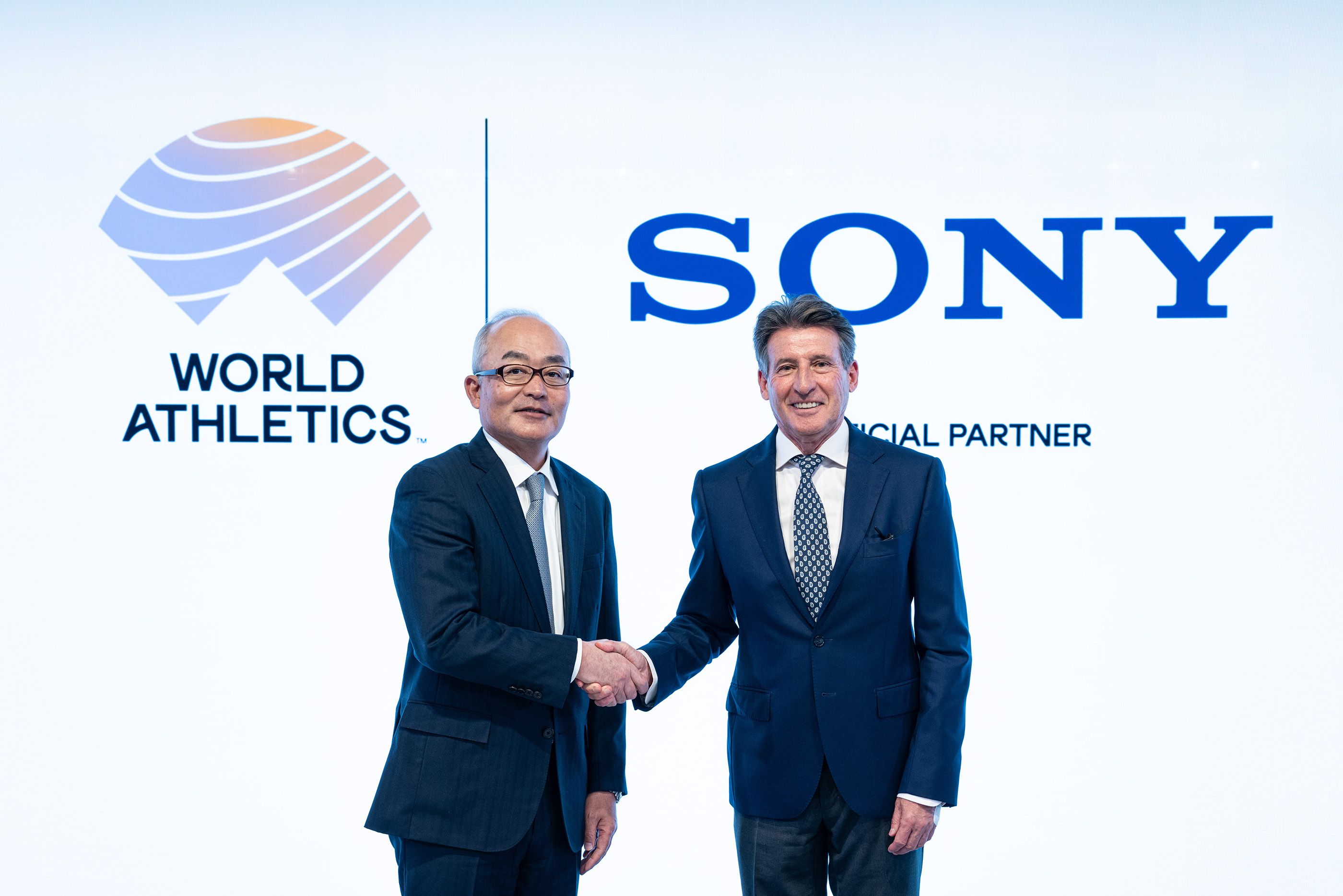 Hiroki Totoki, President COO and CFO of Sony Group Corporation, and World Athletics President Sebastian Coe